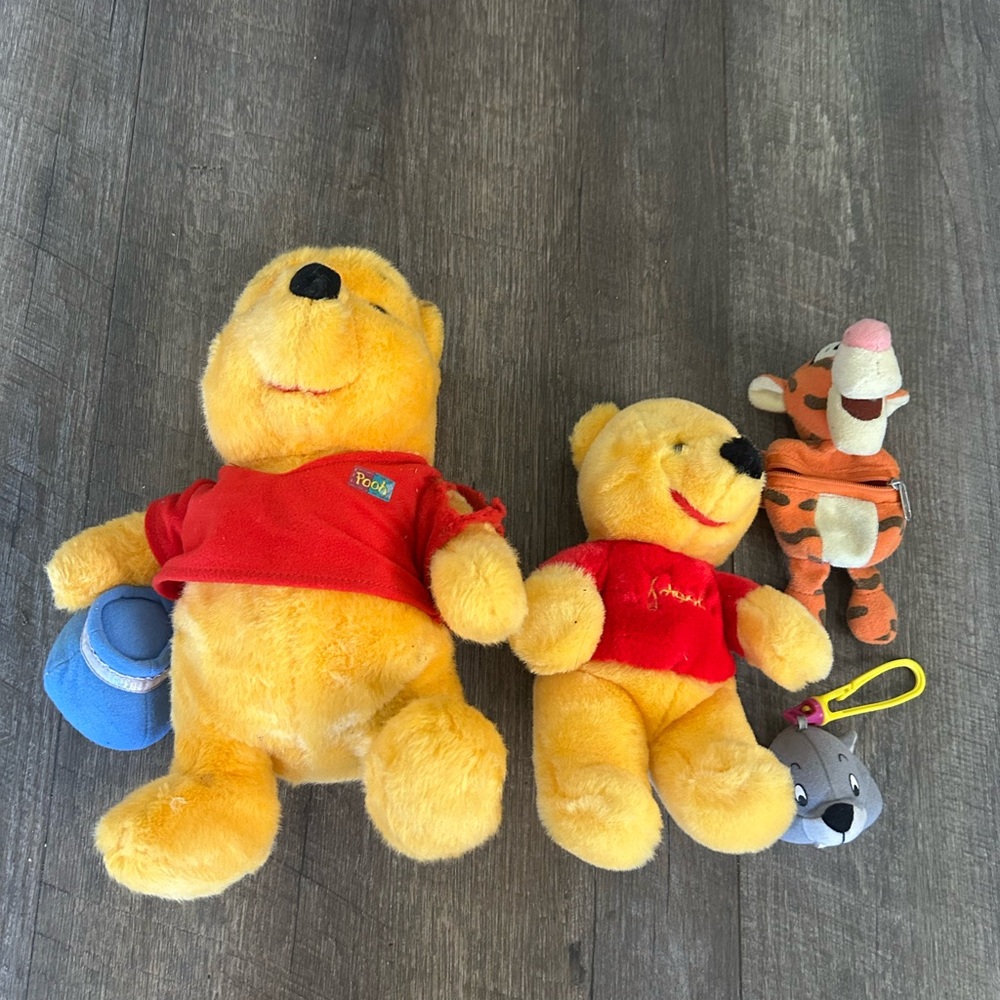 Winnie The Pooh plush dolls and Tigger wrist band